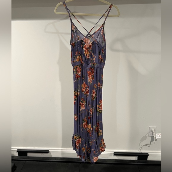 American Eagle Purple Floral Cropped Ruffle Wide
Leg Flowy Jumpsuit - Picture 3 of 7